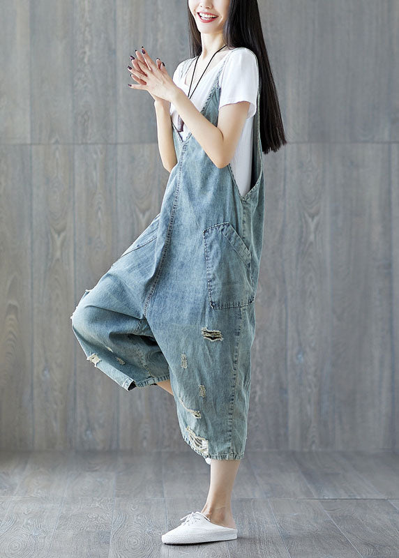 Modern pocket ripped light blue jeans loose jumpsuit spring